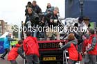 Photographers scramble to get off the lead vehicle at the finish of the Commonwealth Games, Glasgow. Photo: David T. Hewitson/Sports for All Pics